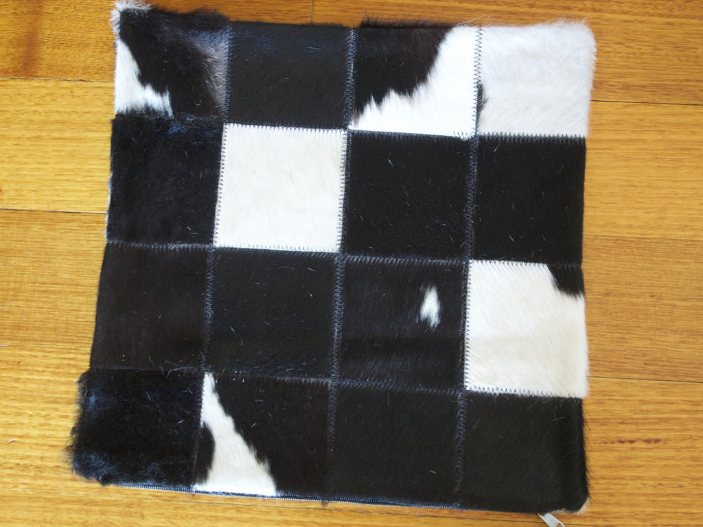A CLASSIC BLACK & WHITE PATCHWORK COWHIDE CUSHION COVER