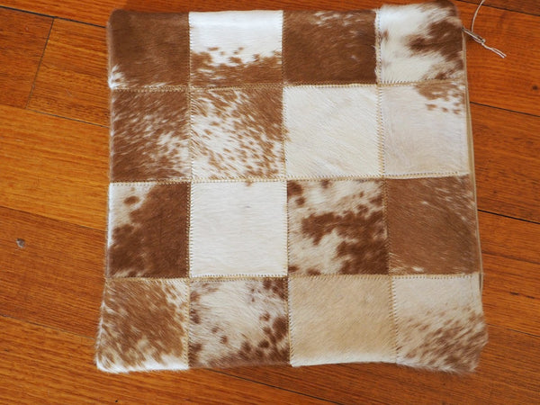 A GORGEOUS CARAMEL BROWN & WHITE COWHIDE CUSHION COVER