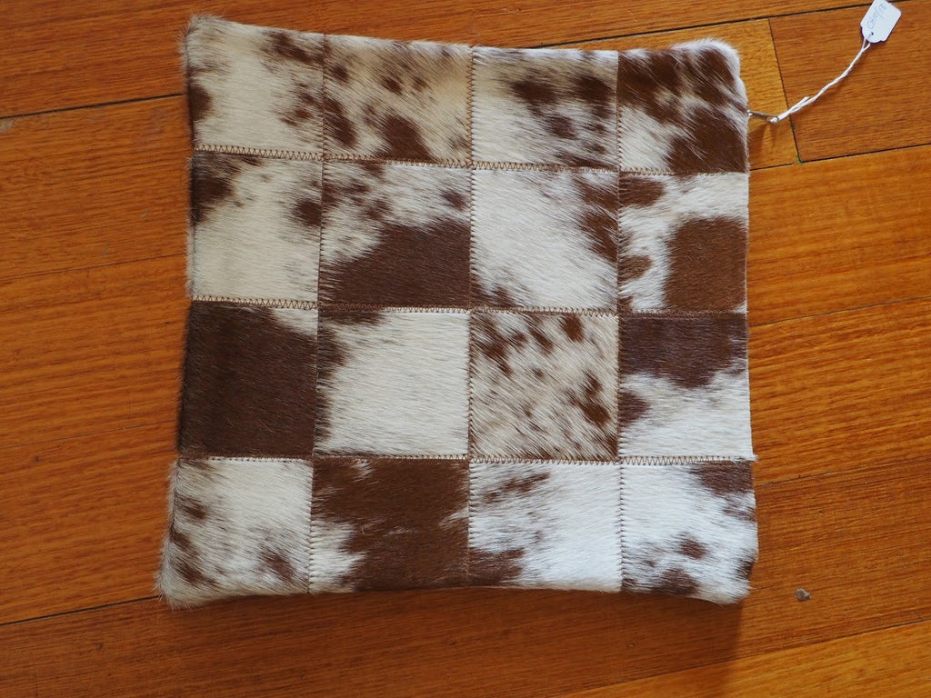 A GORGEOUS BROWN & WHITE COWHIDE CUSHION COVER
