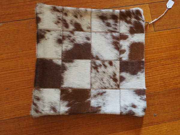 A GORGEOUS BROWN & WHITE COWHIDE CUSHION COVER